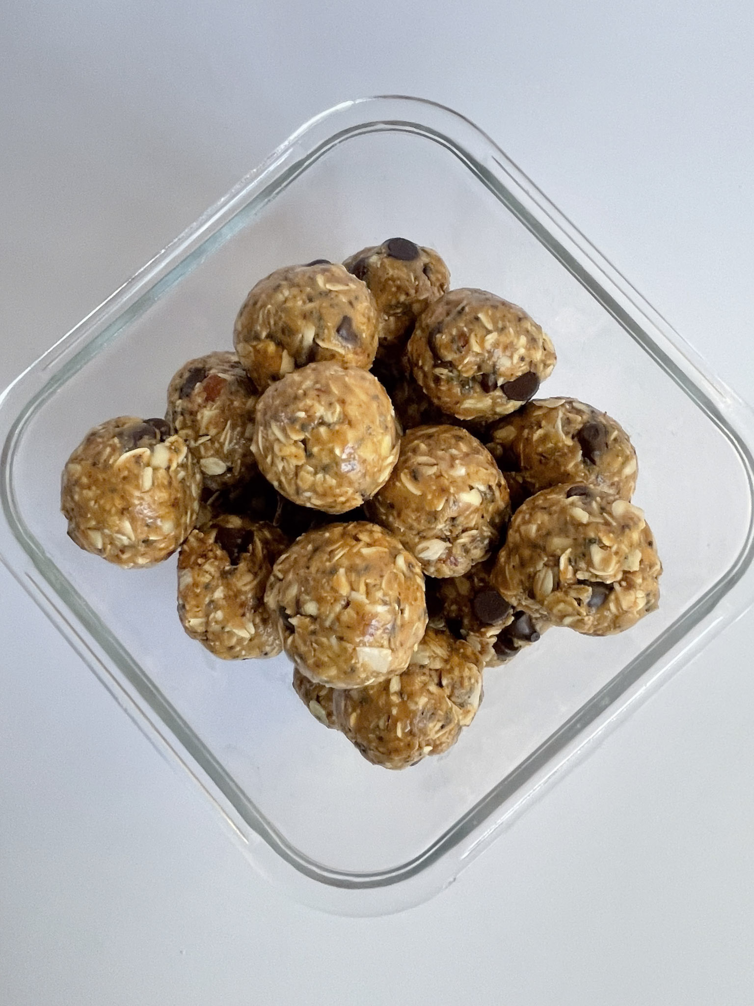 peanut butter energy bites in a glass container